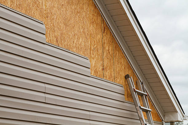 Professional Siding Replacement technician working in Scotland, PA